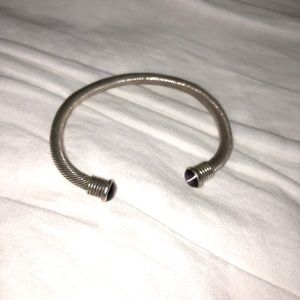 Sterling silver bracelet with purple stones